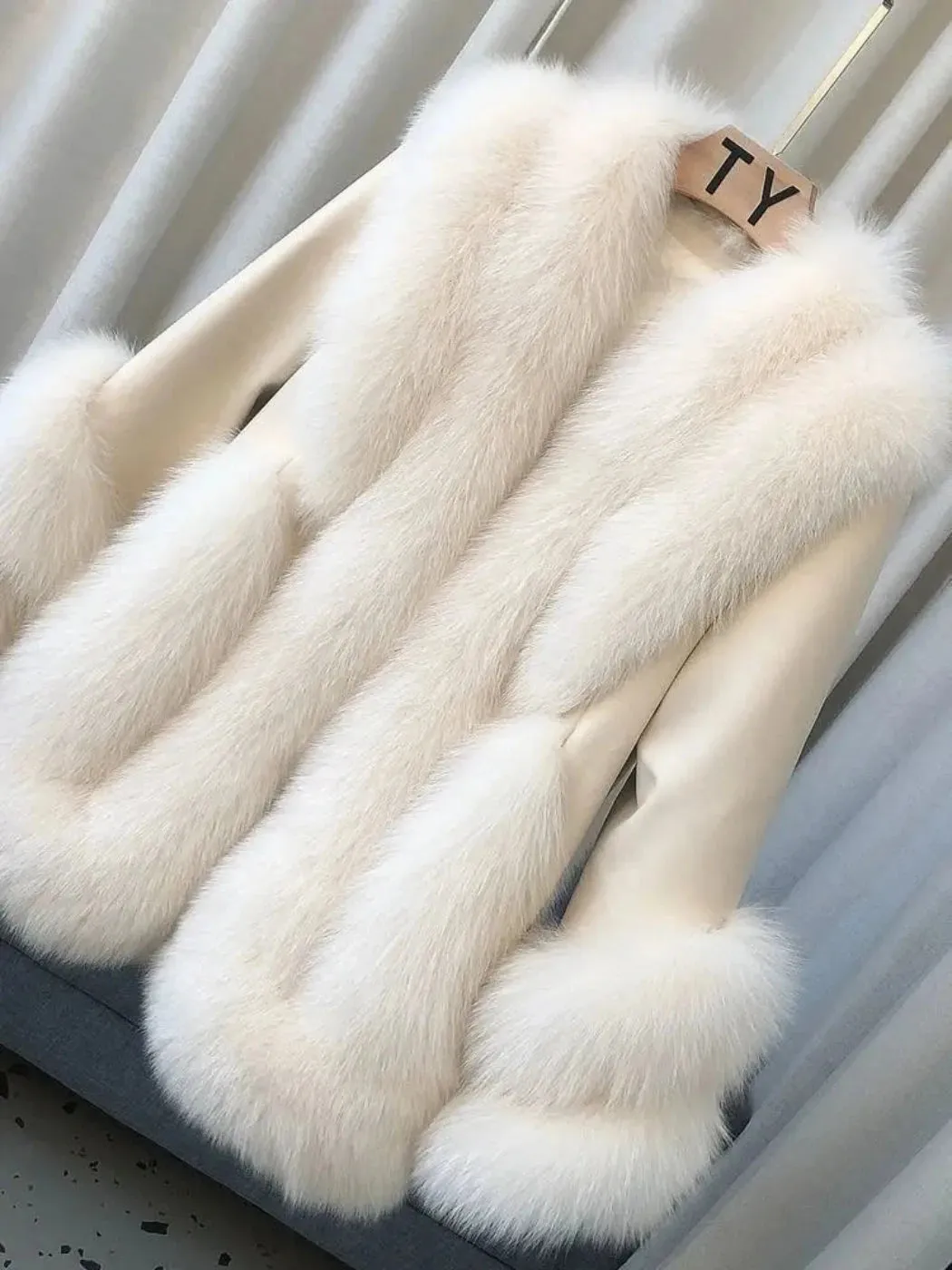 Women's Fox Fur Leather Coat